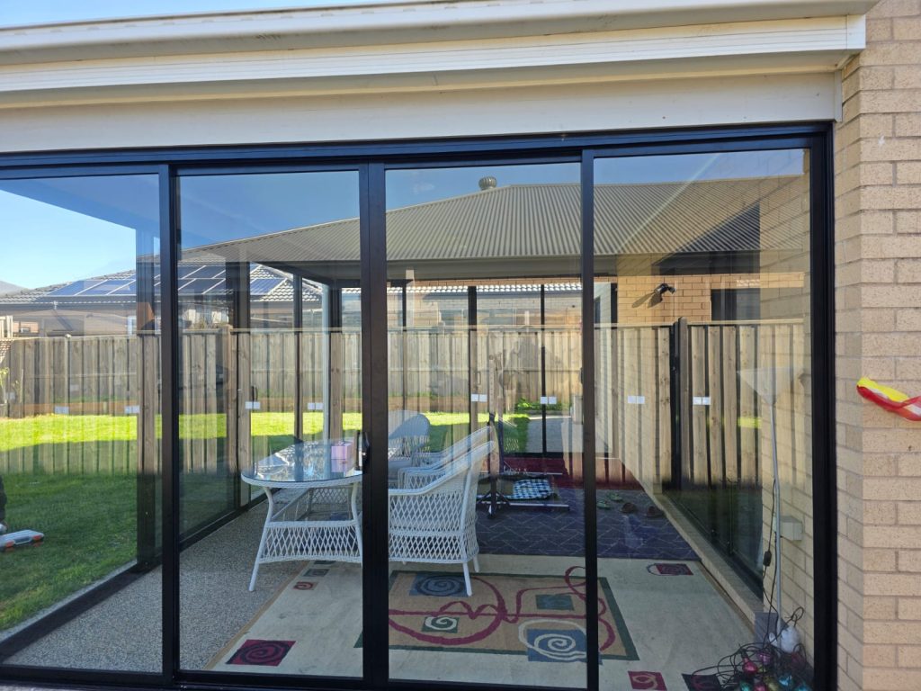 Alfresco Enclosure Glass Stacking and sliding outdoors